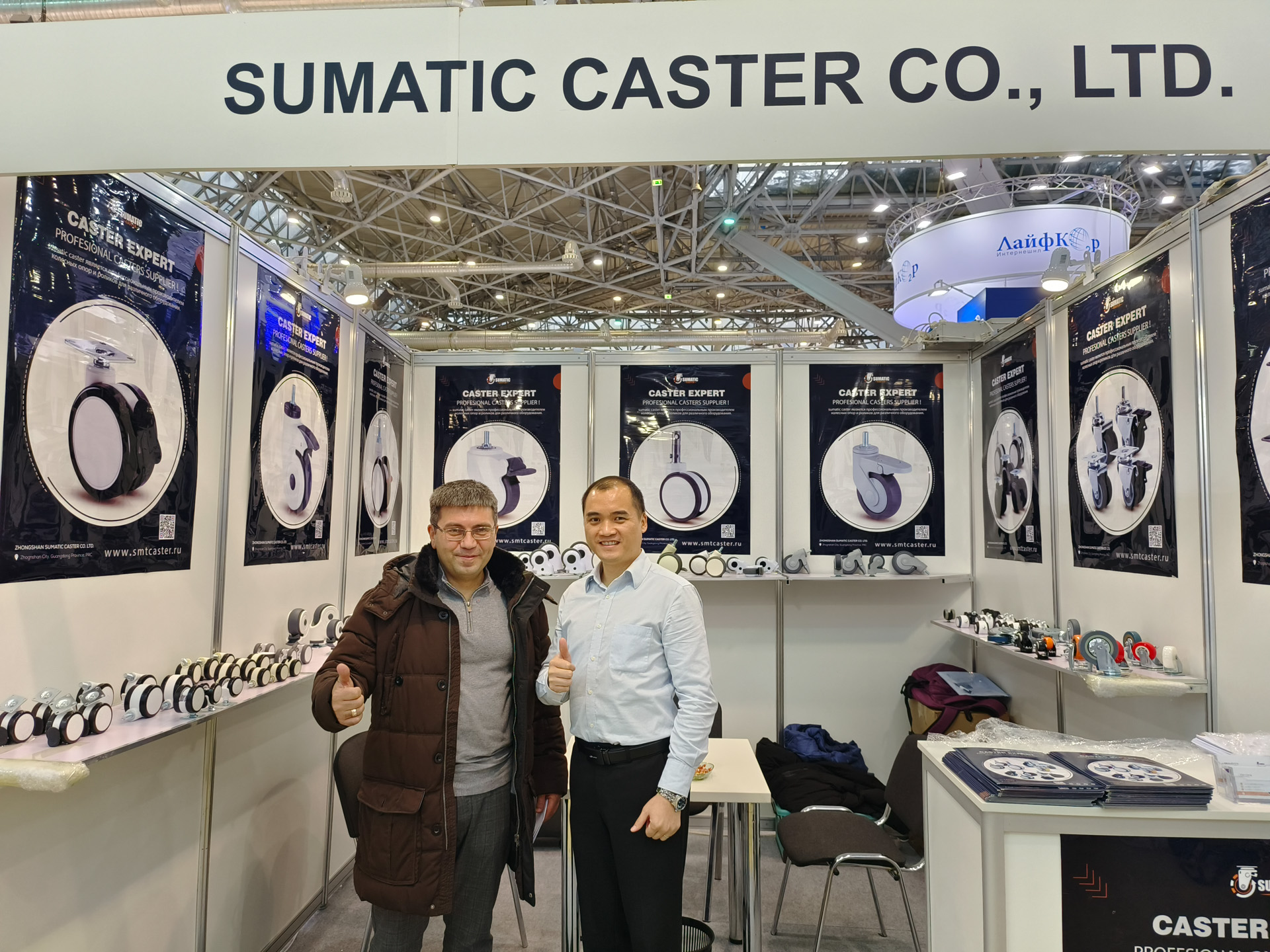 Sumatic team greeting a visitor